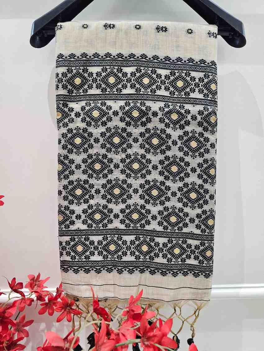 Muga Assam Silk - Off White hue with Black floral Butta