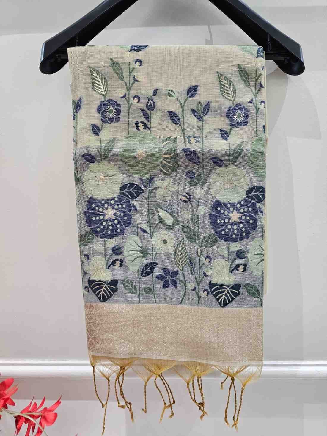 Off white hue with blue floral art muga jamdani  saree