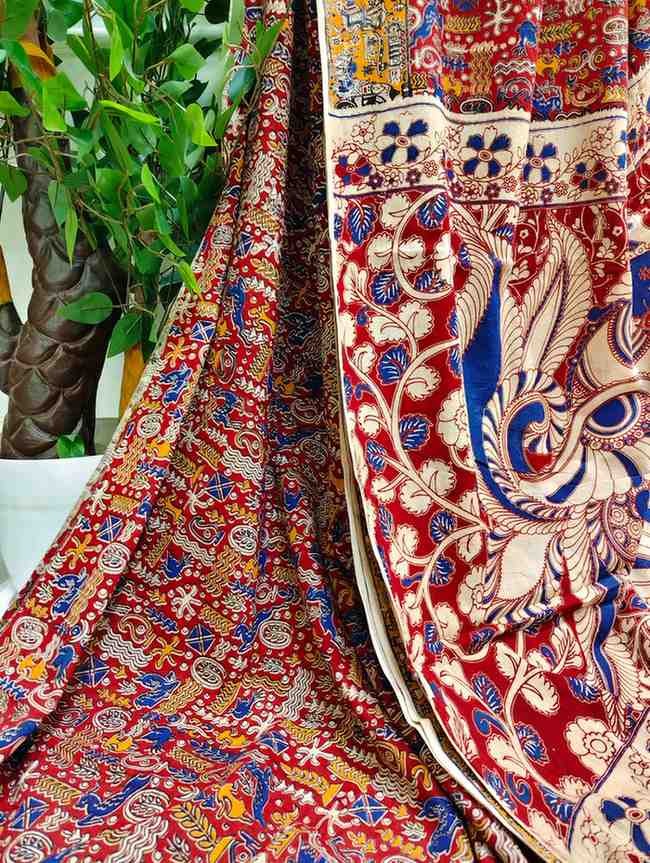 'Karṇika' Rust red with Tribal patterns cotton Kalamkari Saree