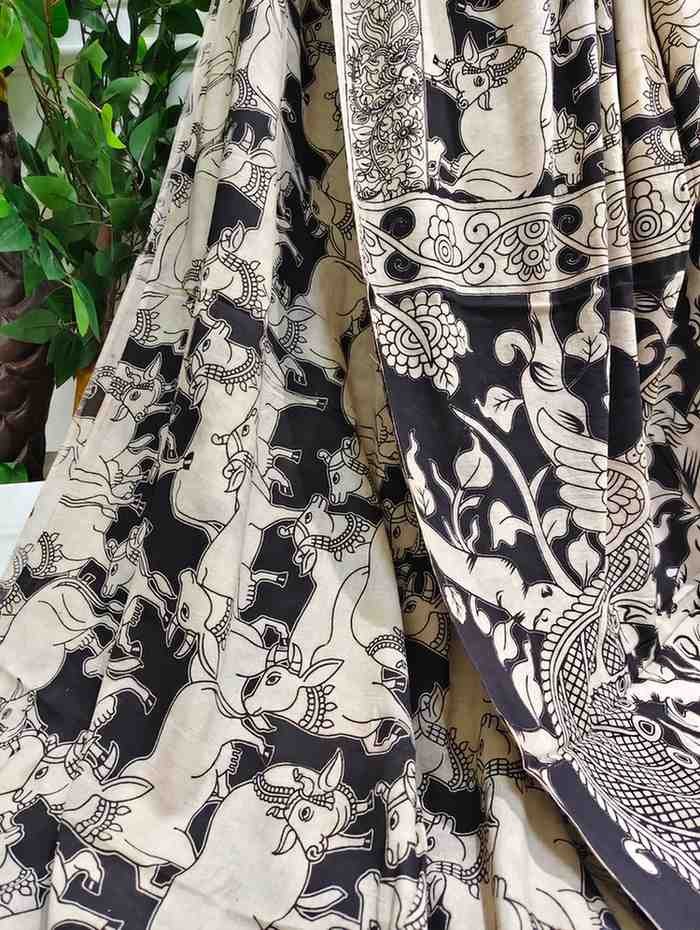 'Kamdhenu' Black canvas with Cow design cotton Kalamkari Saree