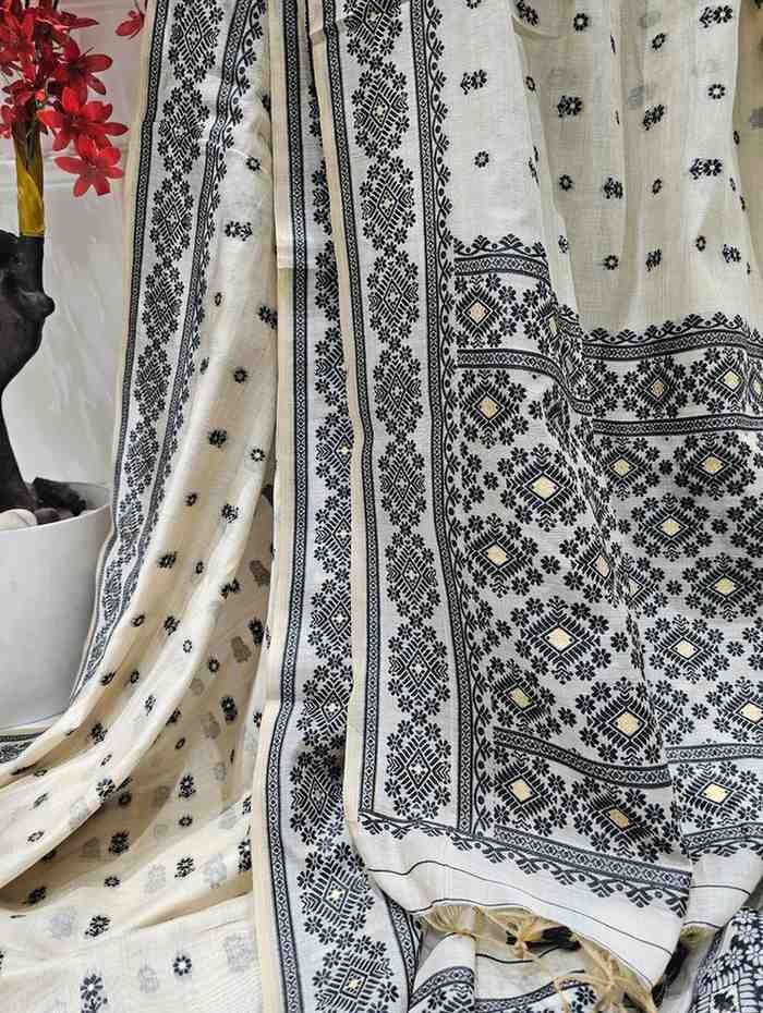 Muga Assam Silk – Off White Hue with Black Floral Butta